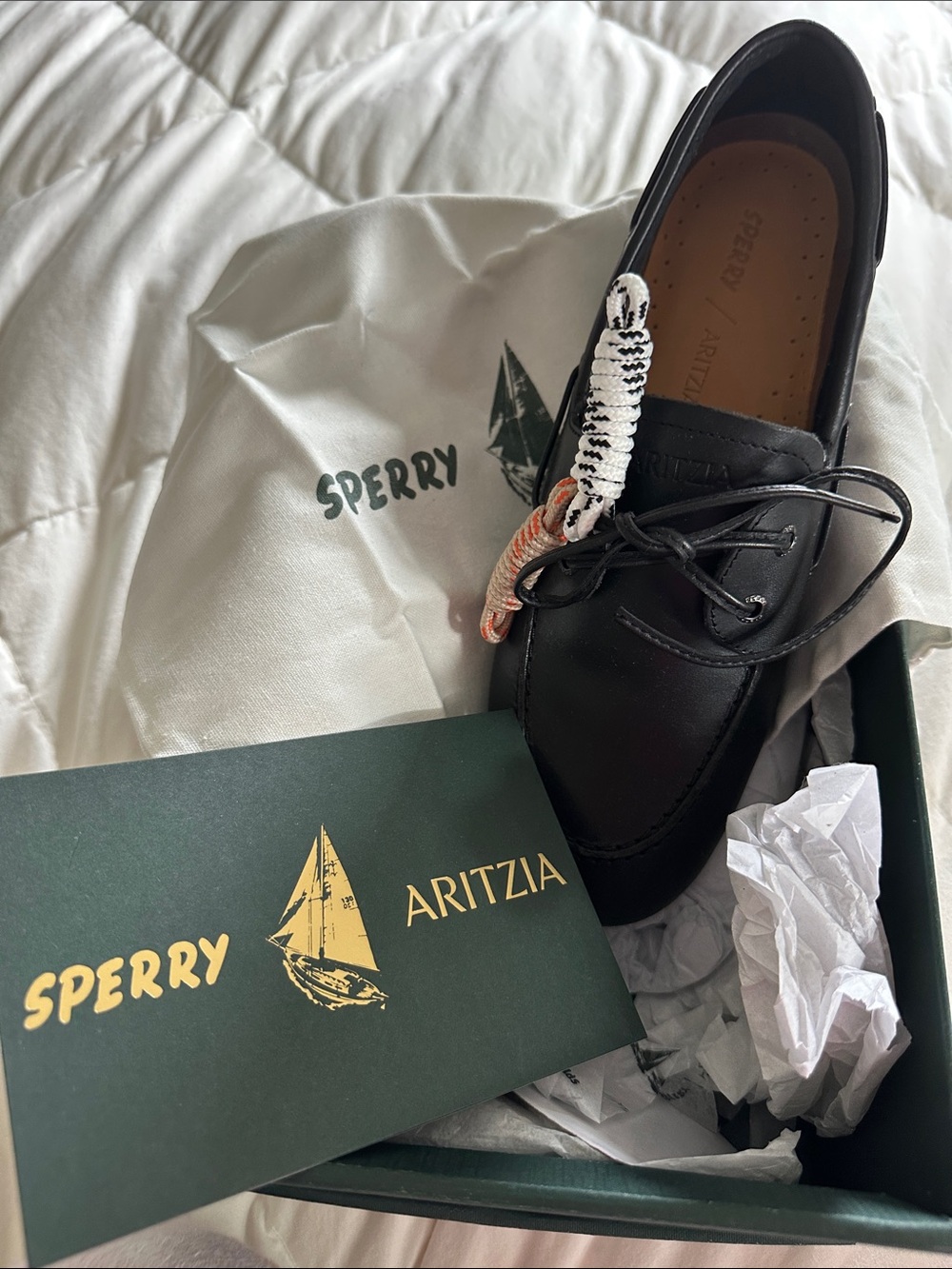 Sperry Black Leather Moc Toe Boat Shoe with Braided Accent